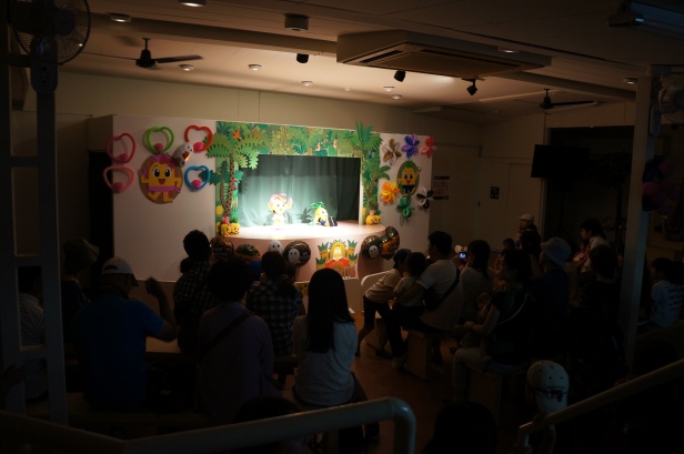 Robots singing and dancing during a pineapple show at Nago Pineapple Park in Okinawa, Japan. 