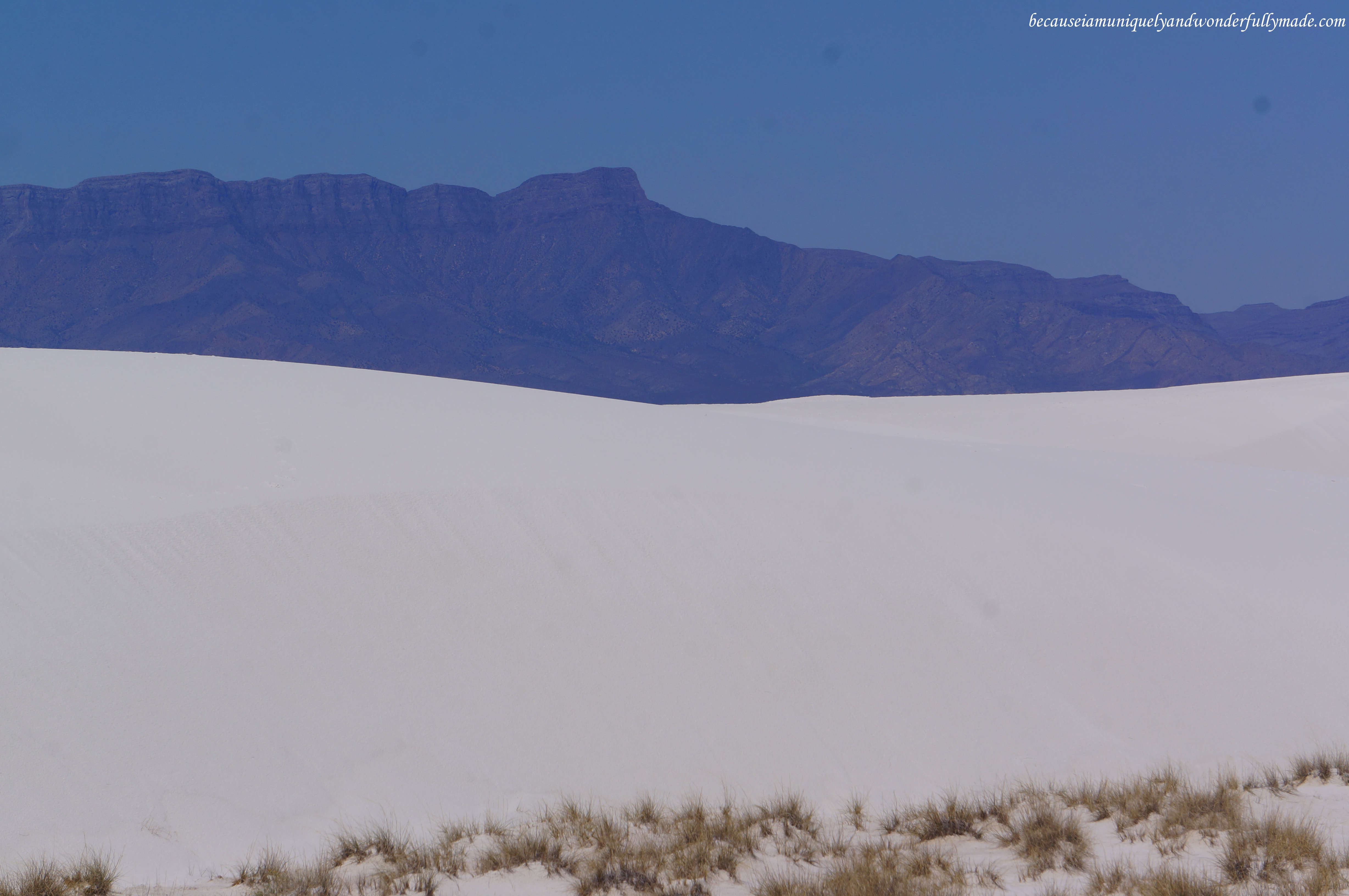 The gypsum (rocks) of New Mexico White Sands National Monument are from the surrounding mountains of the basin - San Andres on the West and Sacramento Mountains on the East.